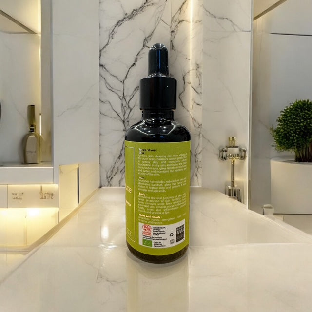 Flacon d’huile d’amande douce pure O’Jawhar – première pression à froid, pour cheveux secs et peaux sensibles.