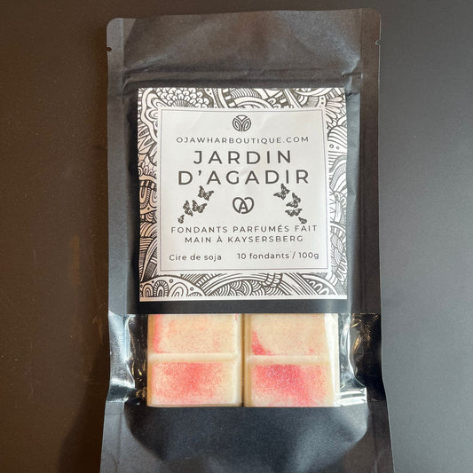 Sachet noir contenant 10 carrés de fondant Jardin Agadir, parfum encens et myrrhe, notes bergamote et muguet, décor micra dorée, fait main à Kaysersberg