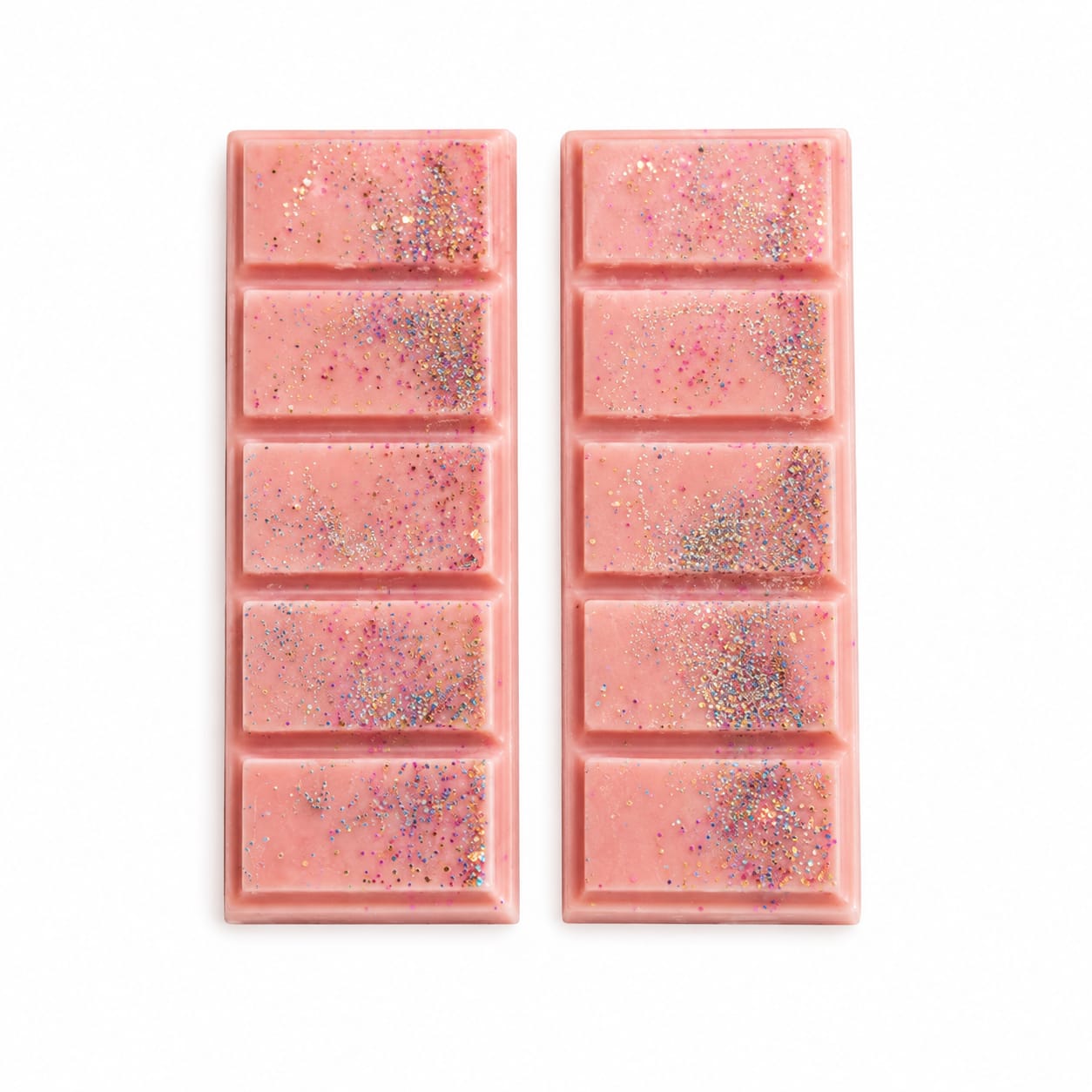 Tablettes de fondants parfumés Oud Vanille roses avec éclats scintillants multicolores sur fond blanc