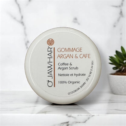 Vue de face du pot de Gommage Argan & Café O’Jawhar – 100 % Bio, nettoie et hydrate.