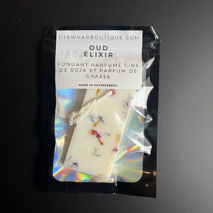 Sachet du fondant suspension Oud Élixir, cire de soja naturelle, parfum boisé et oriental, fabrication artisanale à Kaysersberg.